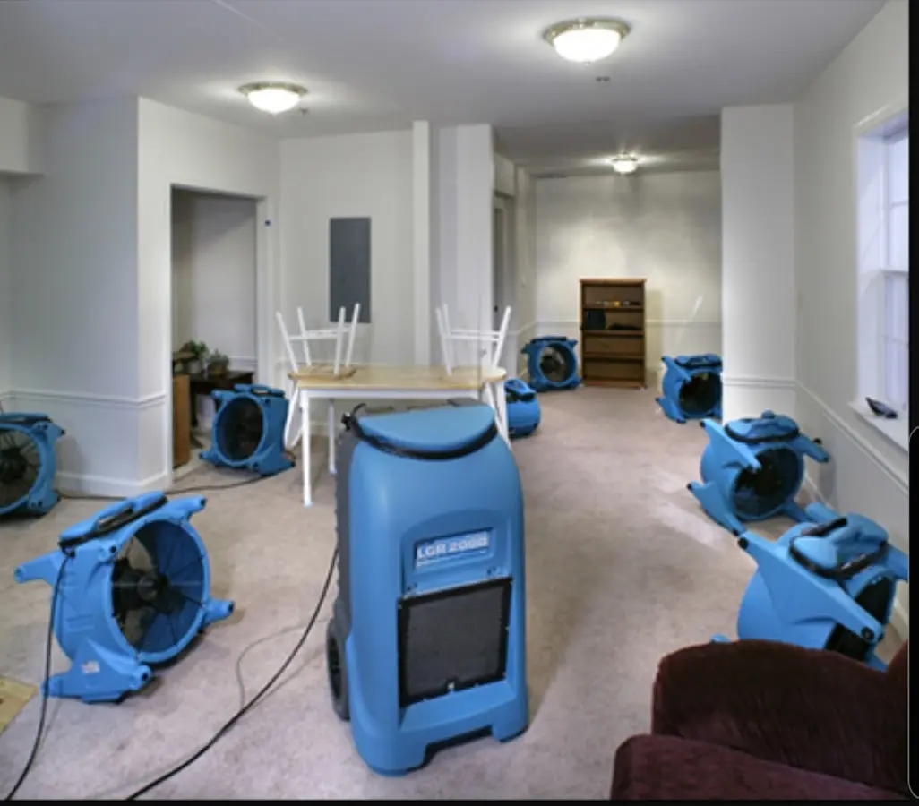 Air movers and dehumidifier setup for Water Damage Restoration in Berea